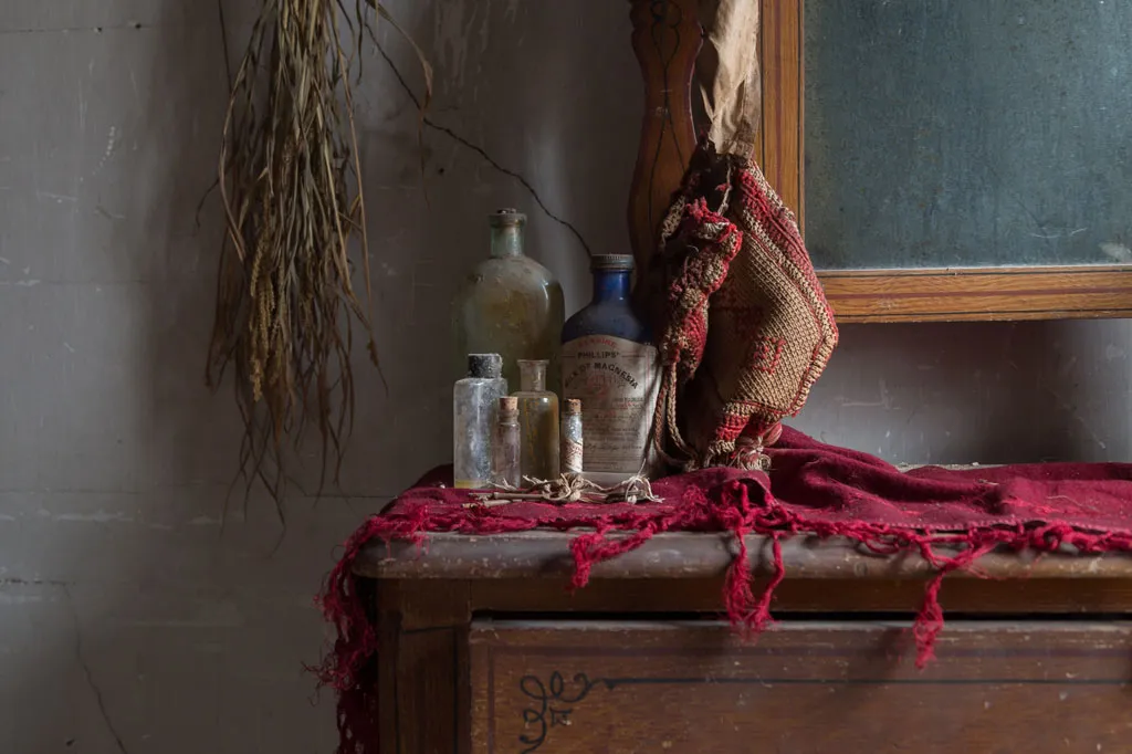 old bottles on a dresser