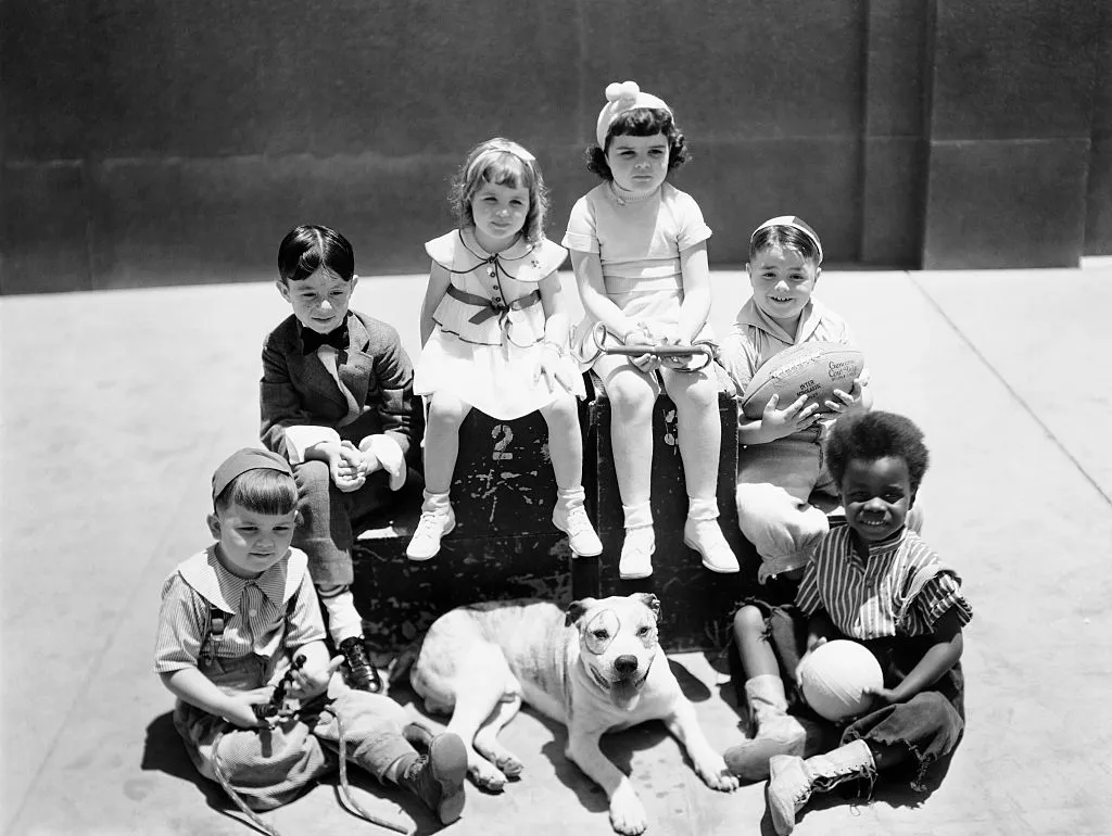 the little rascals with spanky holding a football