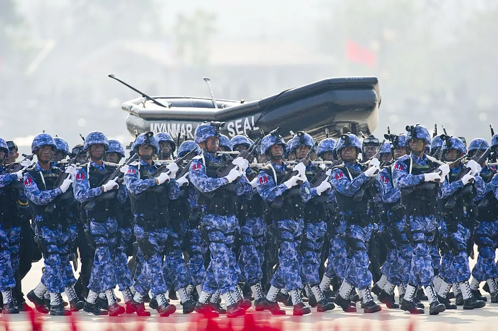 Myanmar Navy Seals march during a ceremony to mark the 70th anniversary of Armed Forces Day