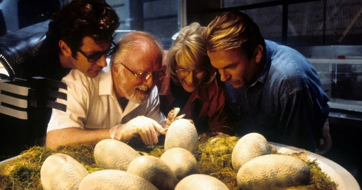 Jeff Goldblum, Richard Attenborough, Laura Dern and Sam Neill watch dinosaur eggs hatch in a scene from the film 'Jurassic Park', 1993