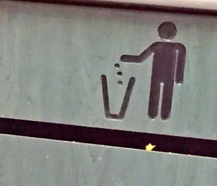 juggler throwing balls in the trash