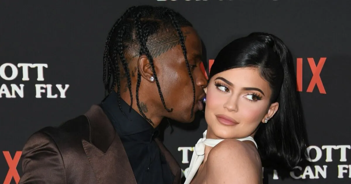 Travis Scott kisses Kylie Jenner on the cheek at the premiere of his film