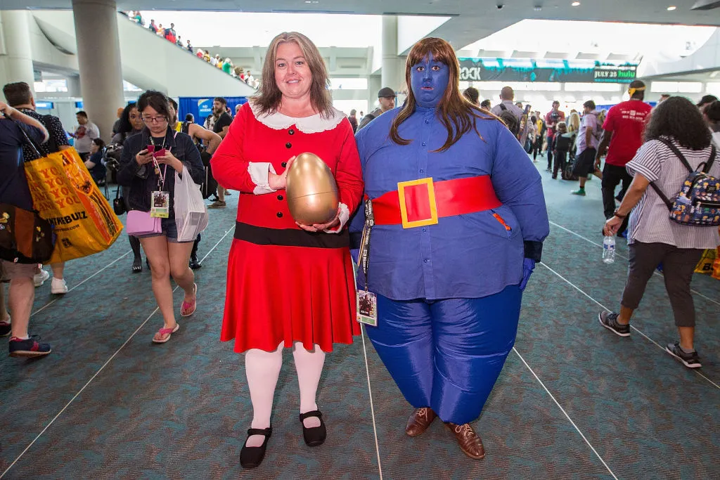 two women dressed as veruca and violet from willy wonka and the chocolate factory