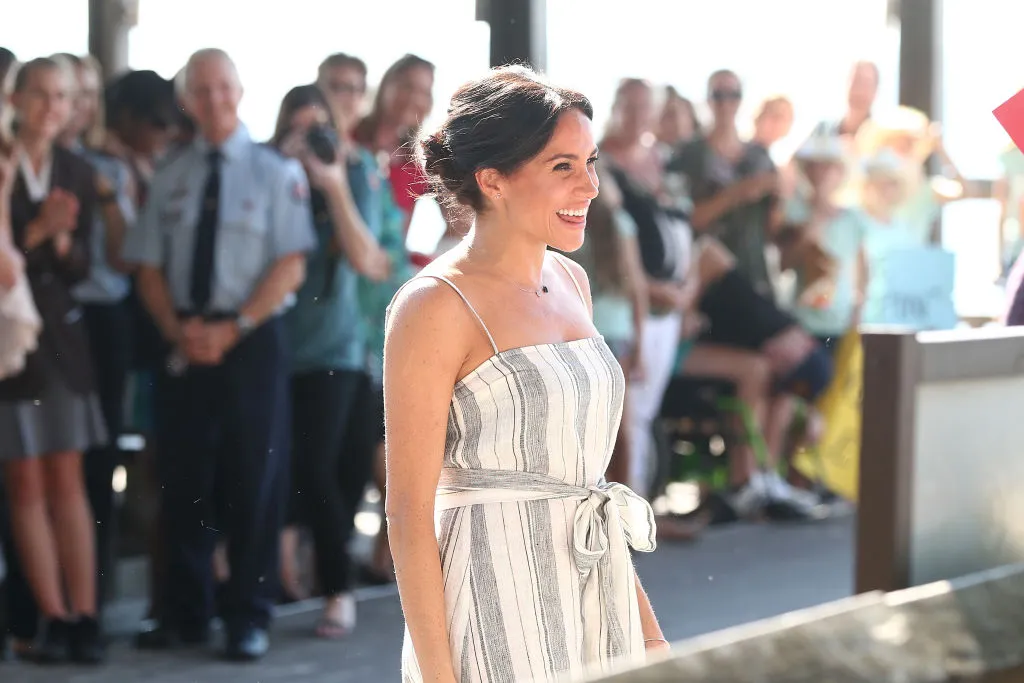 smiling in a linen dress 