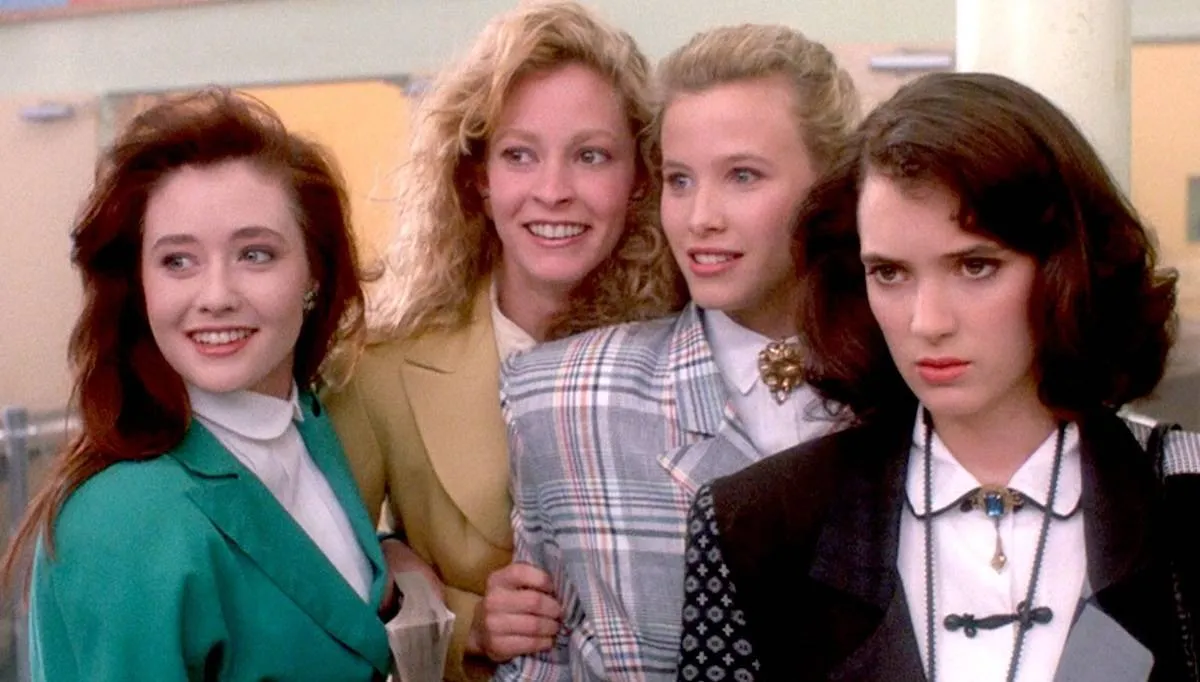 winona ryder and three other girls wearing blazers