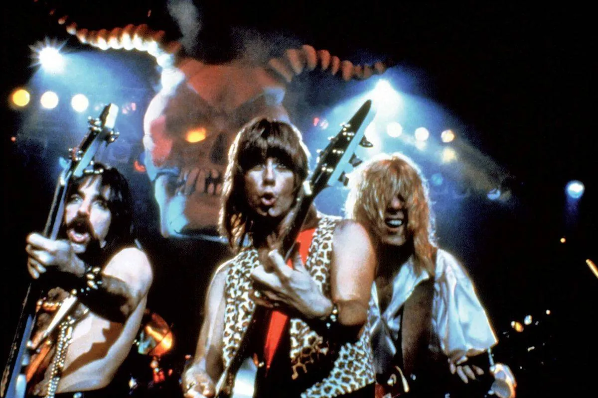 cast of this is spinal tap playing guitars