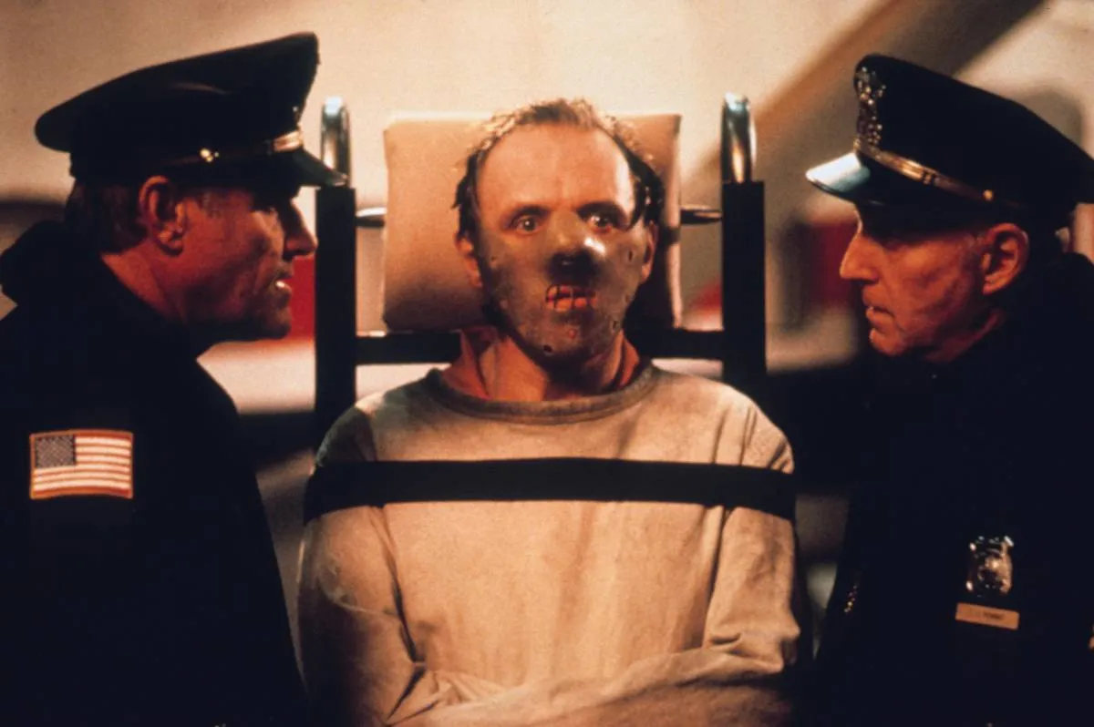 Anthony Hopkins strapped to dolly in restraining mask as Dr. Hannibal Lecter in The Silence Of The Lambs
